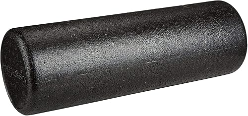 Black high density foam roller on wooden floor