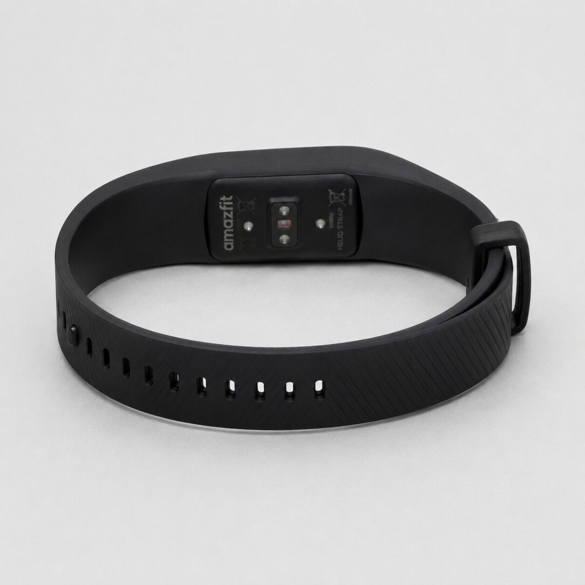 Amazfit Helio Strap recovery fitness band on a clean light gray studio background